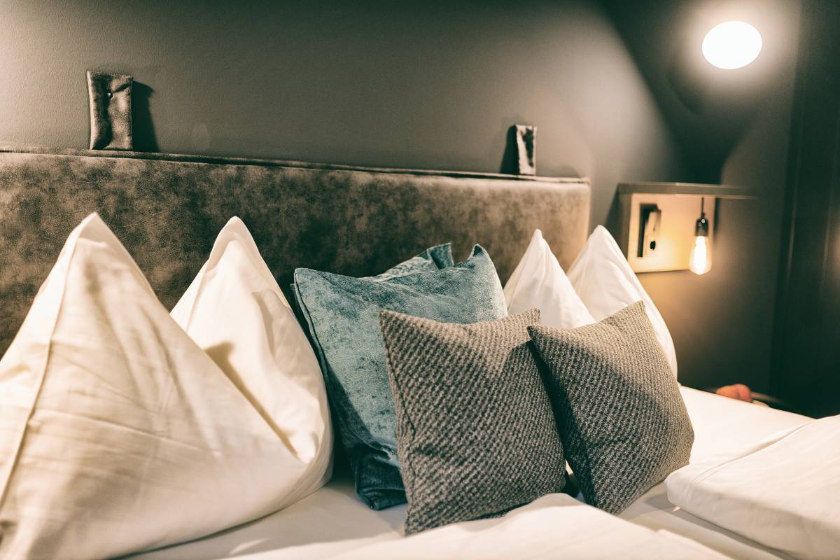 Frisch gemachtes Bett im Hotel Berg-Leben in Großarl